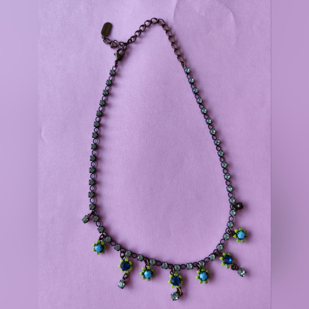 Clara Beau necklace with green rhinestone and blue rhinestone flower dangle